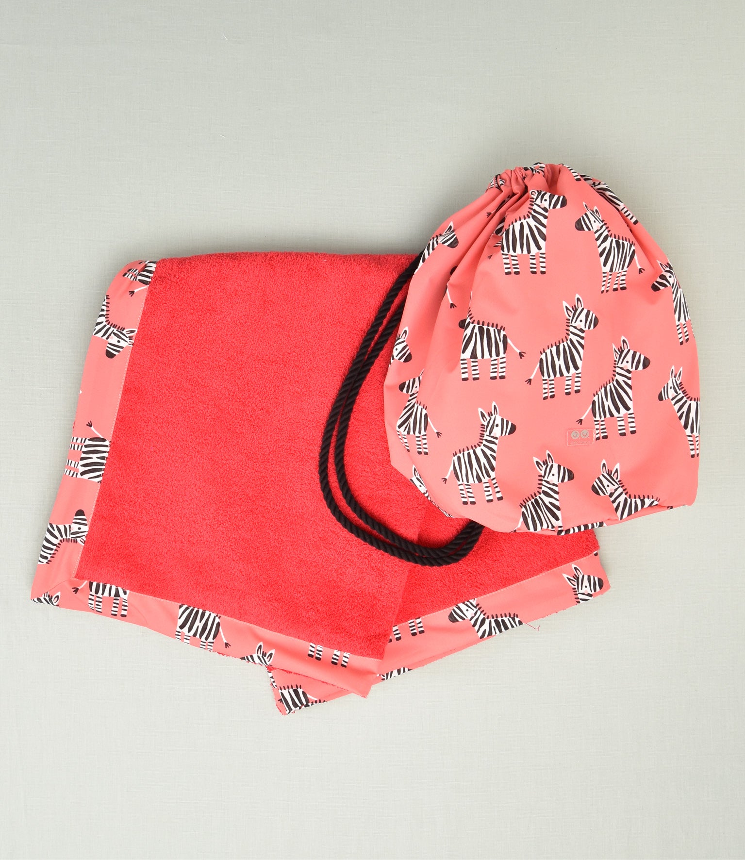 TOALLA CON MOCHILA